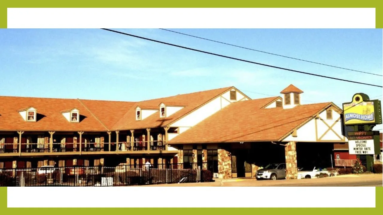 Almost Home Lodge exterior with covered walkways in Branson